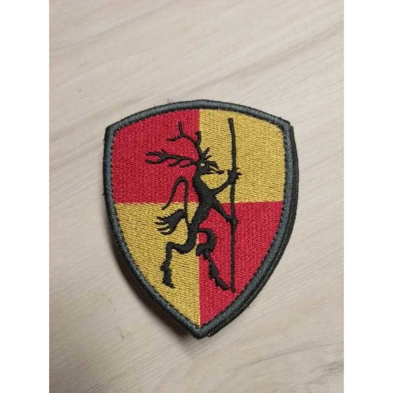 Emblemat z logo klubu strzeleckiego KSGlauberyt