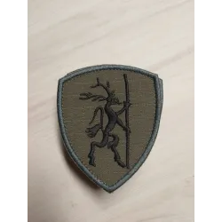 Emblemat z logo klubu strzeleckiego KSGlauberyt