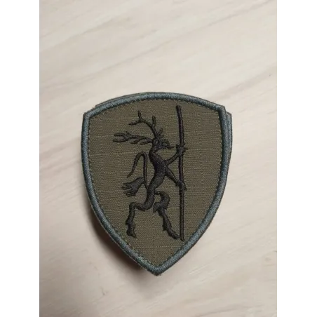 Emblemat z logo klubu strzeleckiego KSGlauberyt